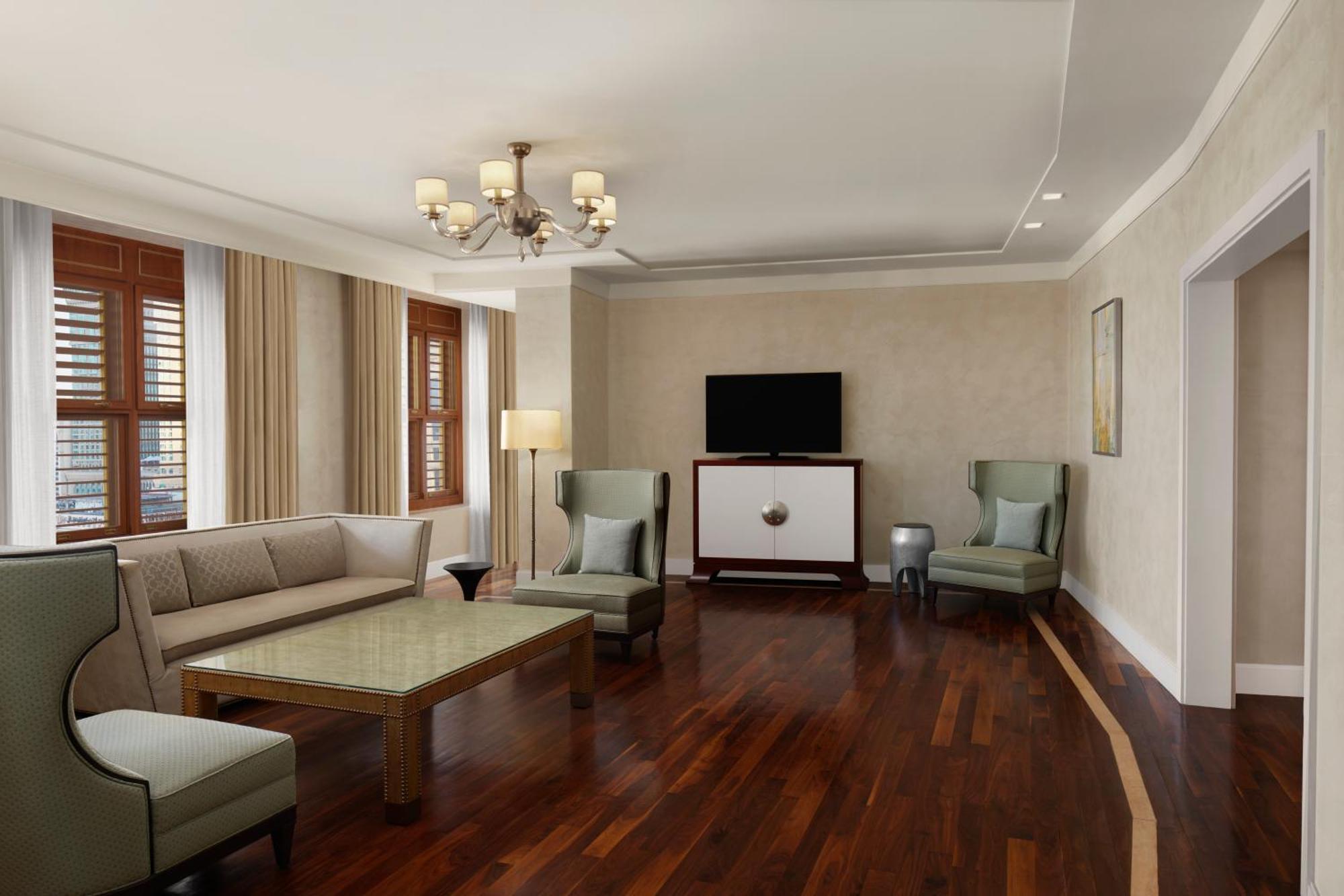 Hilton Hotel & Convention Jabal Omar Makkah Mekka Kültér fotó A living room in a suite at the Ritz-Carlton, Boston